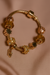 <h3>Pulsera con Charms Oro Envejecido</h3><b>PIEL DE OTOÑO</b>
